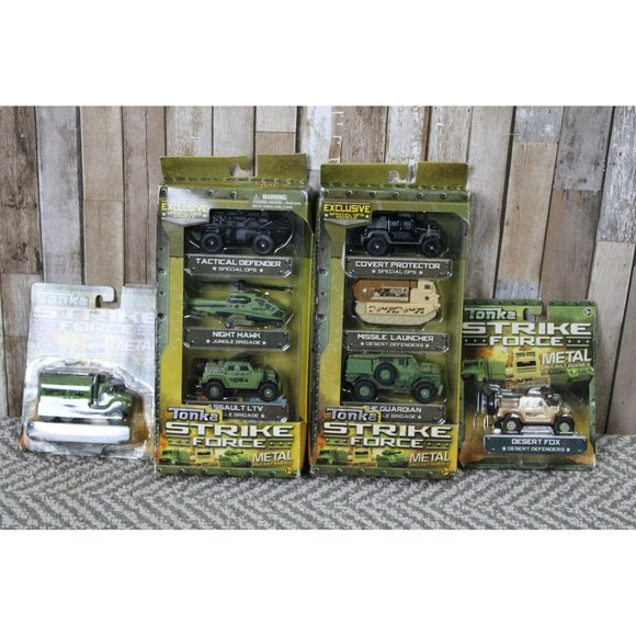 8 Tonka Strike Force Metal Diecast Bodies - NIB - Picture 1 of 9